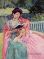 Auguste Lisant à sa fille mères des enfants Mary Cassatt
